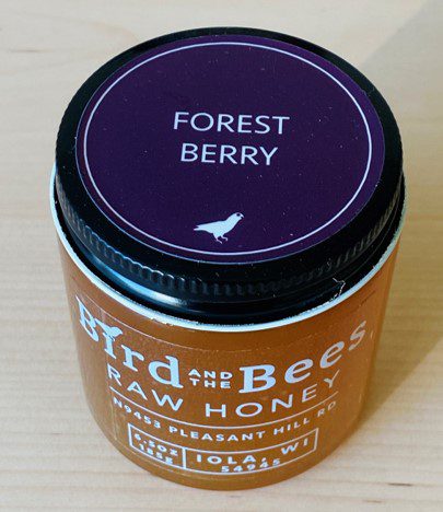 6.5 ounce glass jar of raw honey by Bird and the Bees Apiary. This is an early season honey that is full of berry flavor, with a hint of tartness. It is comprised of black berry, raspberry and other wild berry nectars.