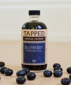 8 ounce glass bottle of blueberry infused maple syrup by Tapped