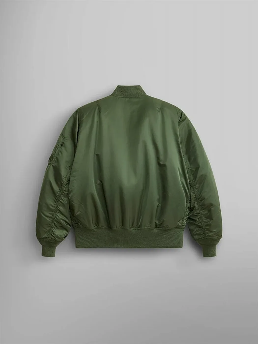 Back of Alpha Industries sage green MA-1 bomber jacket with ribbed trim